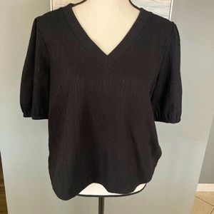 Loft cute Black top with puff sleeves. NWT. Size medium